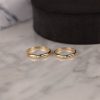 15 pcs.( approx.) .035 Carat Round Cut Diamonds ( VSI-SI Clarity; GH to HI Color )  Width: 2.4 mm Thickness: 1.4 mm Ring Size: 6 ( Can be resized half size bigger and half size smaller ) Metal: 18 Karat White Gold Weight: (approx.) 2.85 grams
