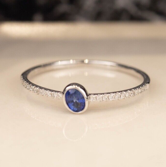 .22 Carat Blue Sapphire w/ .07 CTW Diamond Ring 18K White Gold R255W