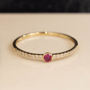 1 pc (approx) .10 Carat Ruby 18 pcs (approx) .0039 Carat Diamonds (SI Clarity; GH Color) 18 Karat Yellow Gold Ring Size: (Cannot Be Resized) Imported Setting (approx) 0.70 Grams Please send a message to get available ring size/s before placing an order.
