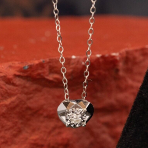 1 pc (approx) .023 Carat Diamond (VSI-SI Clarity; FG to GH Color) .23 Carat Face Diamond Illusion 18 Karat White Gold Length of Chain: 13.5” 14.5” 15.8” (Adjustable) Pendant is Detachable Imported Setting (approx) 0.95 grams